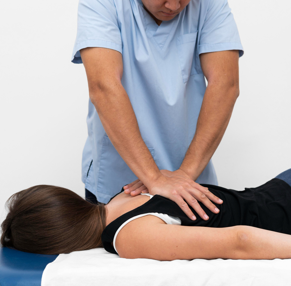 front-view-physiotherapist-massaging-woman-s-back.jpg